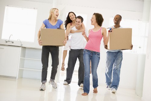 House movers loading furniture for a London home move