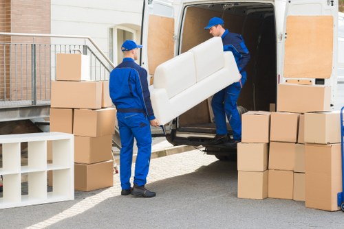 City moving specialists coordinating boxes and furniture during a London removal