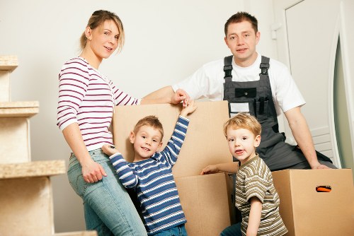 Packing and labeling items for an office move in London