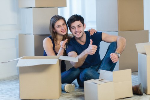 Careful loading of household items for a man and van move