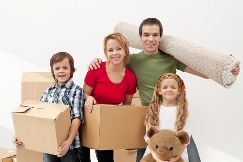 Business relocation preparation checklist beside office moving boxes