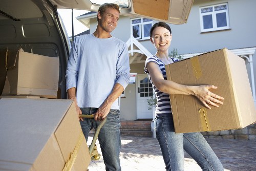 Unpacking boxes into rooms after a London house move