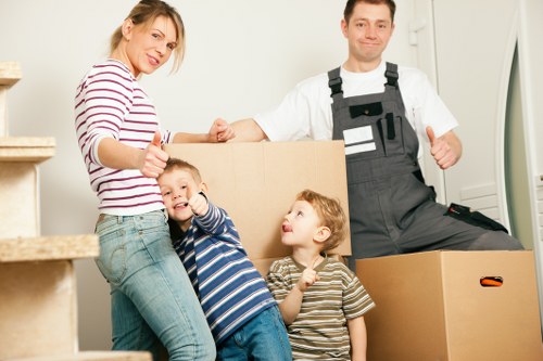 Local office relocation items loaded into a removals van
